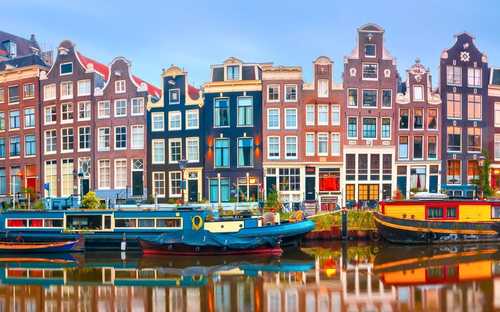 Amsterdam Hop-On Hop-Off Bus Åben sightseeingbus ved kanalerne i Amsterdam